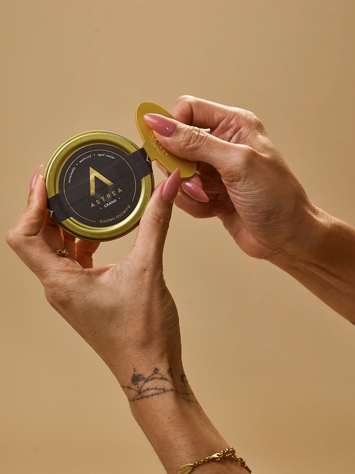 Astrea Caviar Matte Gold Tin Opener